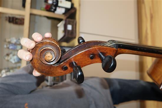 A cased cello with bow